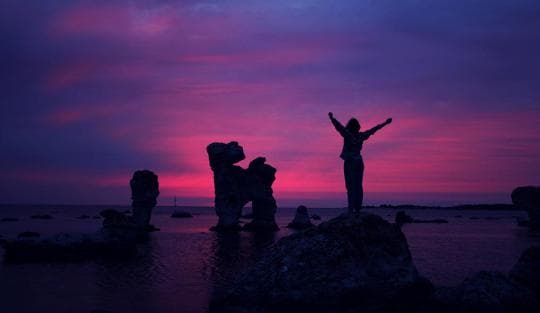 Happy with at sunset